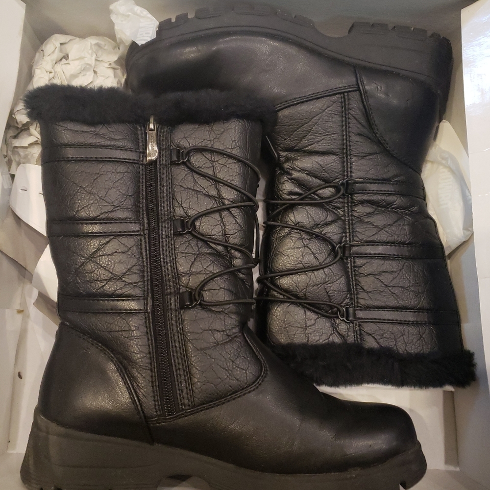Female black whether boots